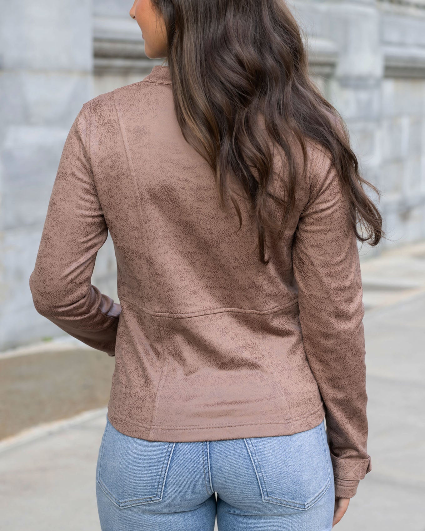 back view of taupe leather like cafe racer jacket