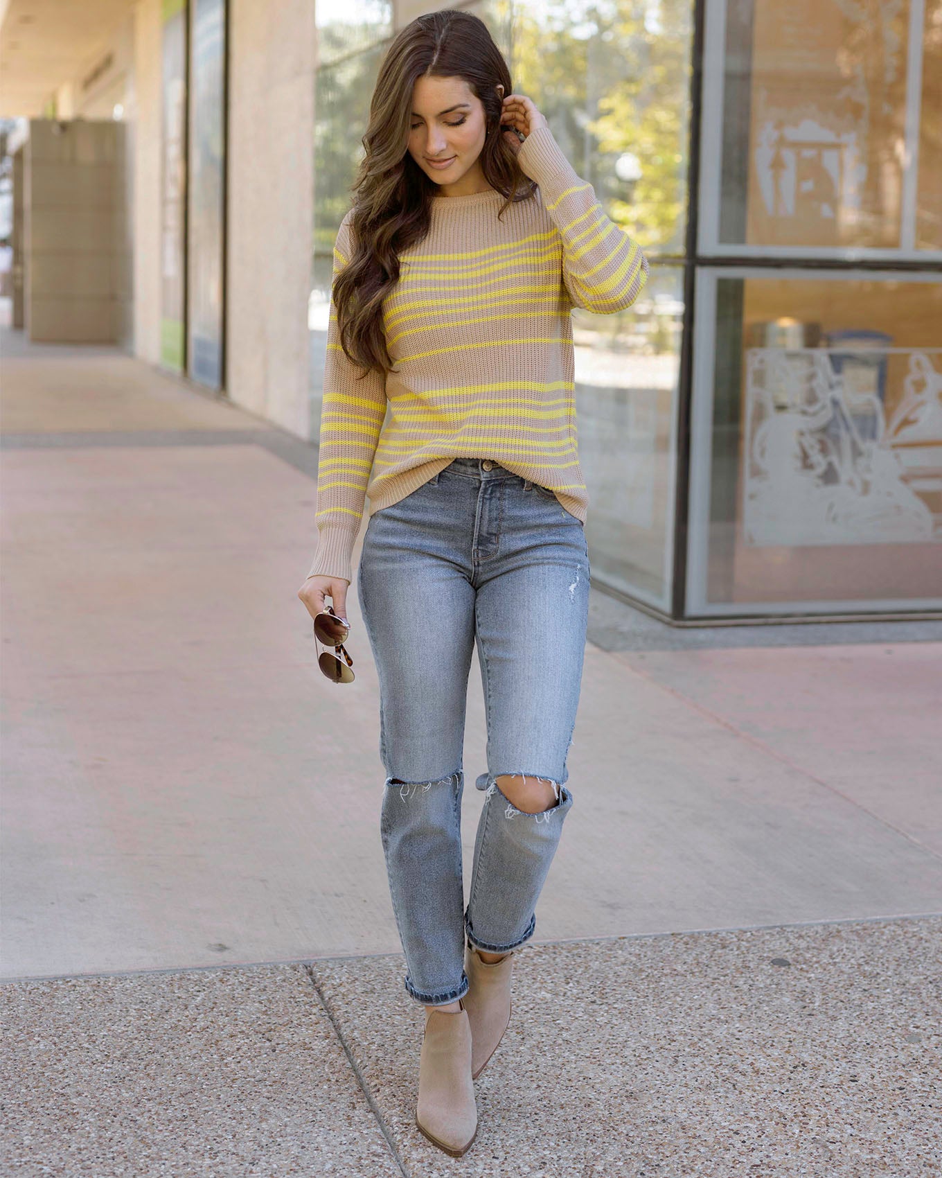 Styled view of Lemon Lines Lightweight Sweater with front tuck
