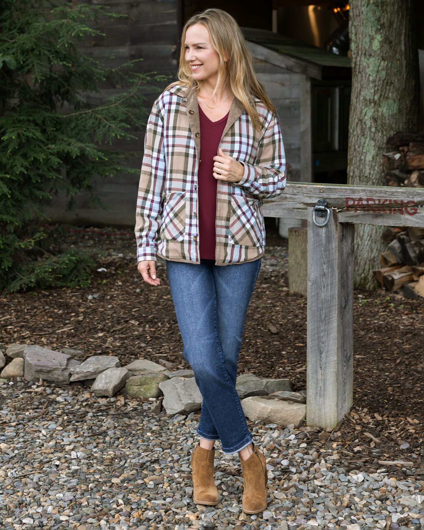 full body view of ribbed long sleeve top in wine