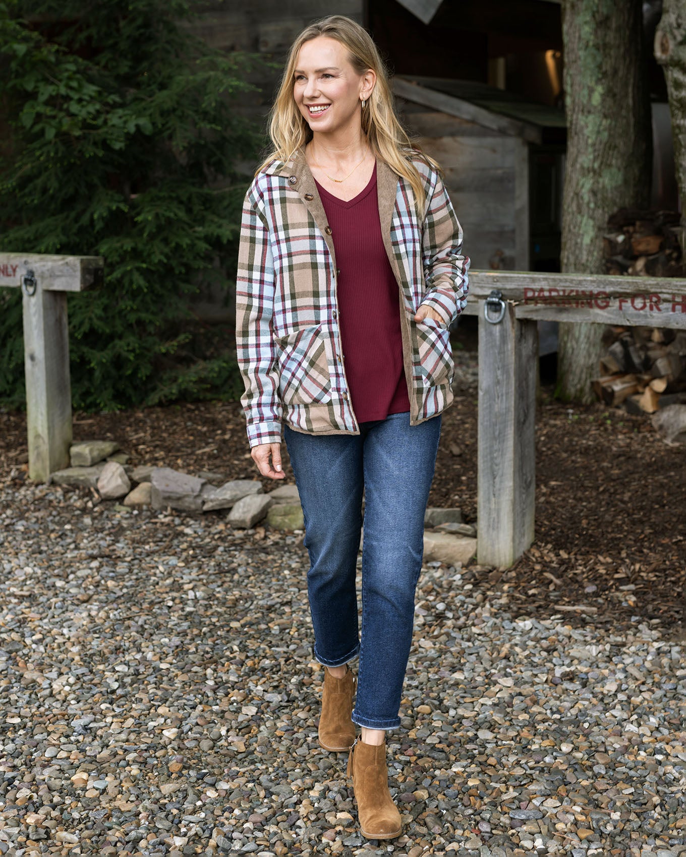 full body styled view of ribbed long sleeve top in wine