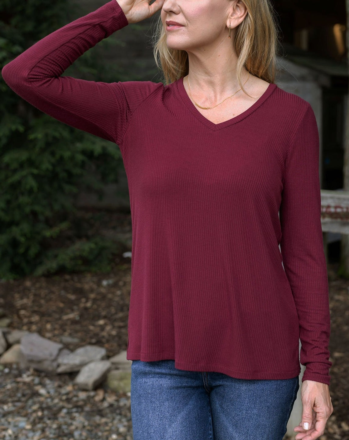 close up view of ribbed long sleeve top in wine