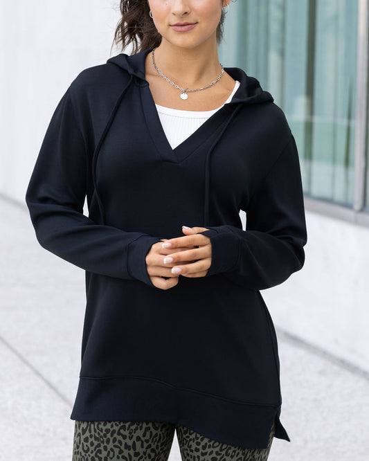 front view of black hooded pullover