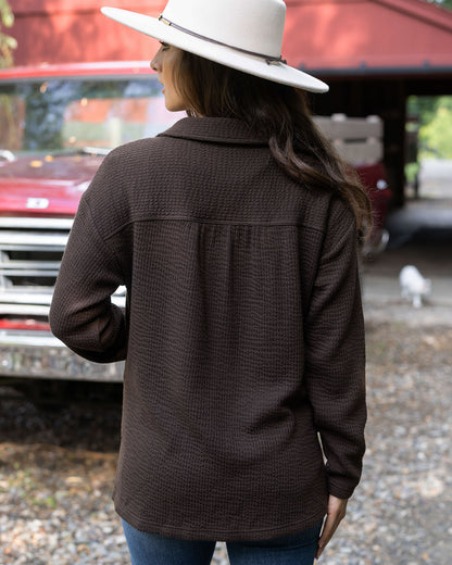 back view of brown ribbed shacket