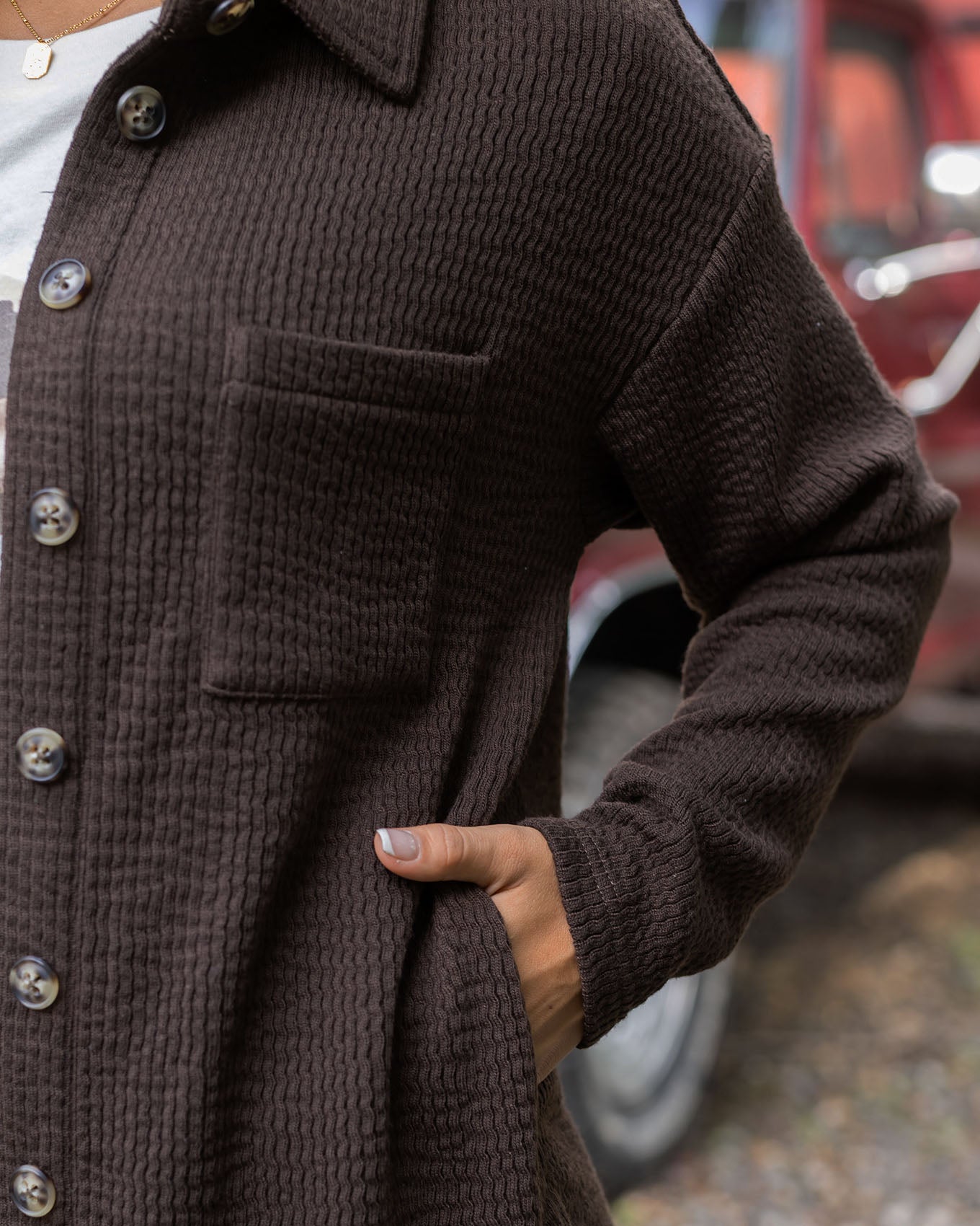 detail view of brown ribbed shacket