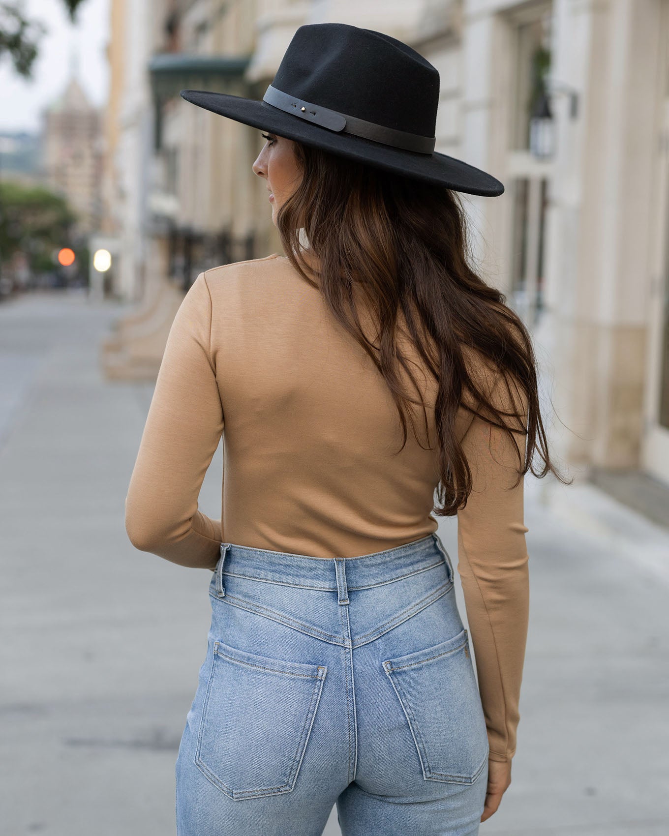 back view of camel luxe long sleeve bodysuit