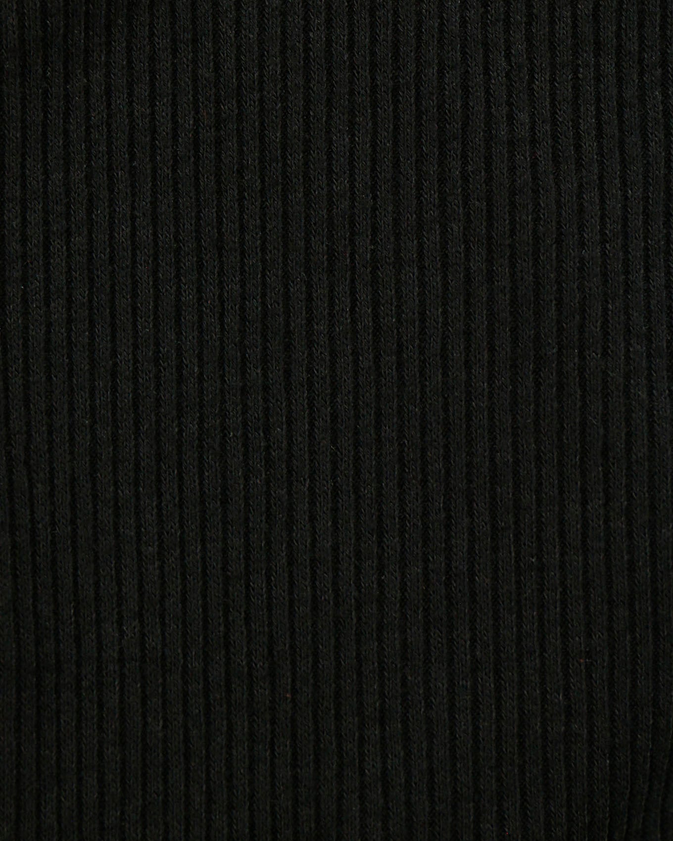 close up view of fabric on macy day ribbed top in black