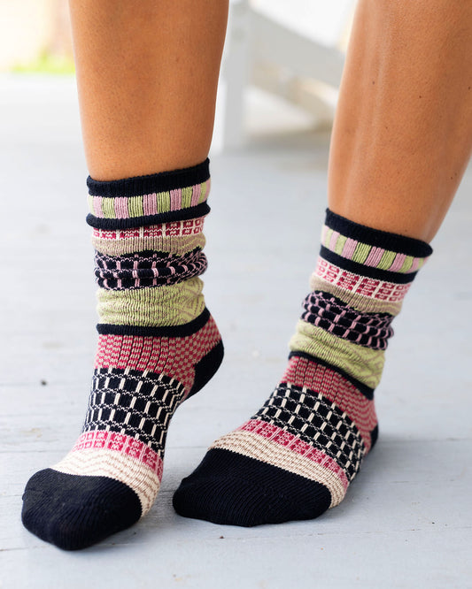 front view of navy/pink/lime intarsia socks