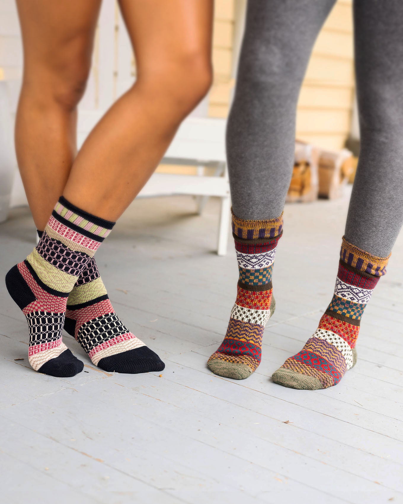 side by side view of navy/pink/lime intarsia socks