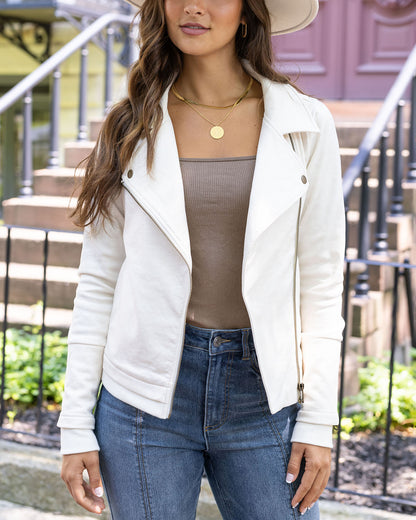 front view of cream move-free leather like moto jacket