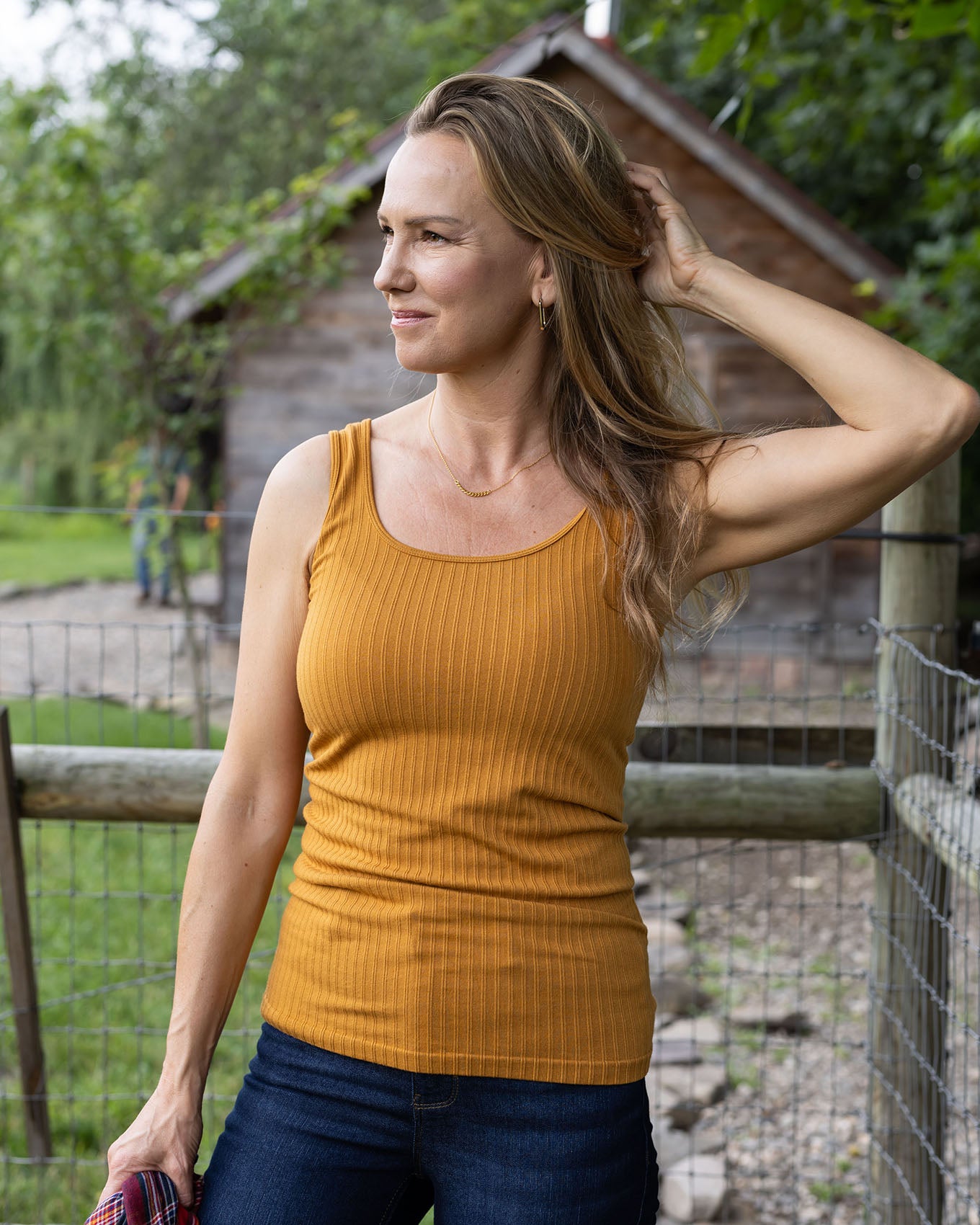 front styled view of deep mustard seamless ribbed tank