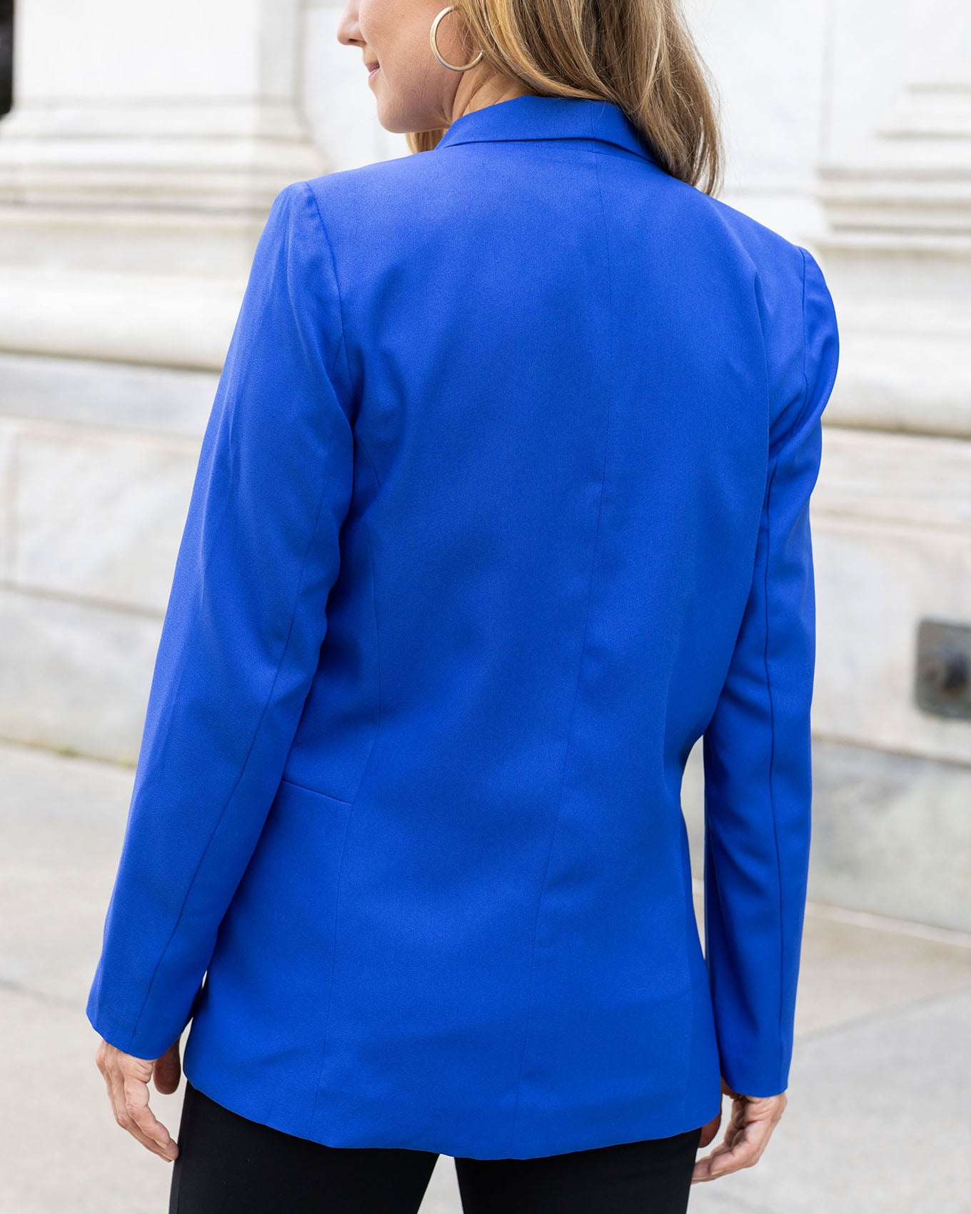 back view of pocketed royal blue fashion blazer