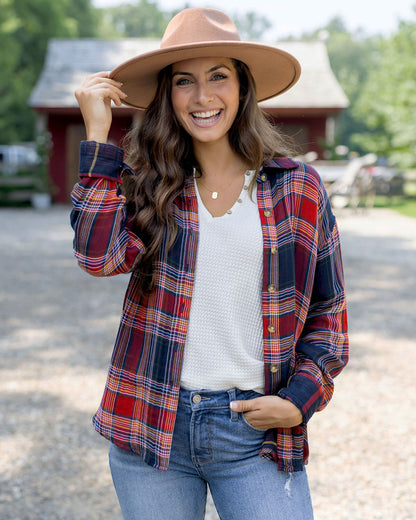 close up view of reversible plaid shirt