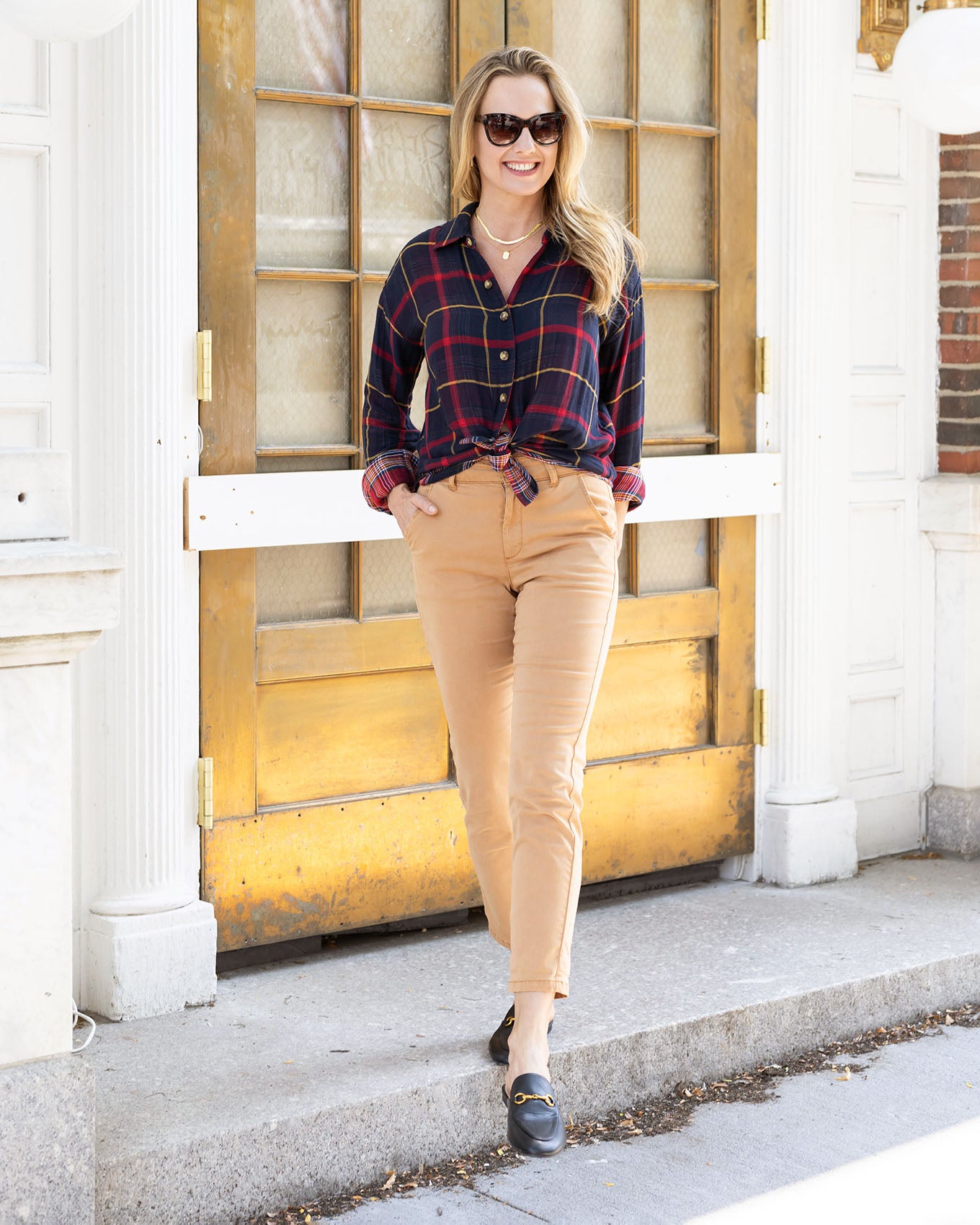 full body view of reversible plaid shirt