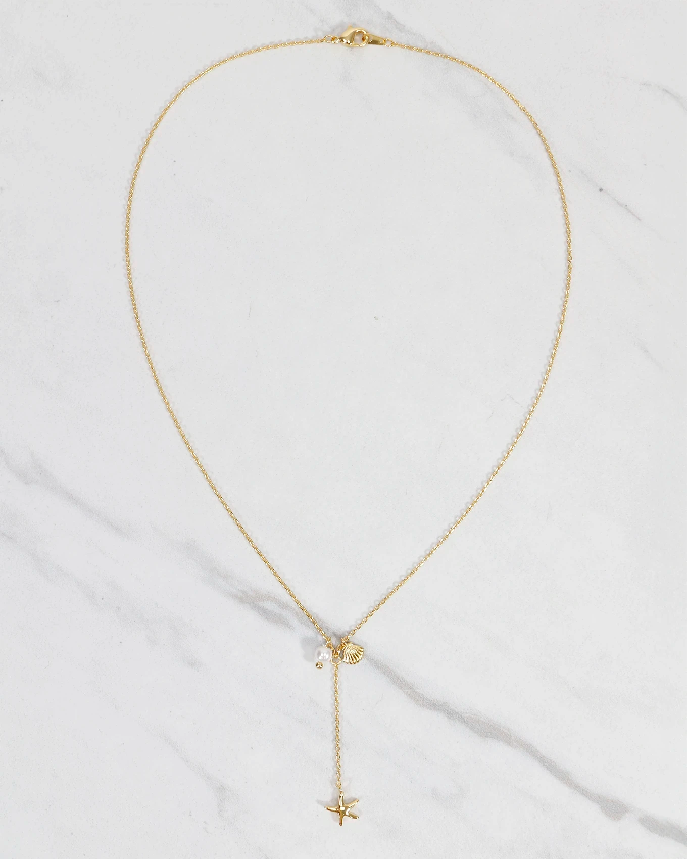 Seashells Drop Necklace in Gold