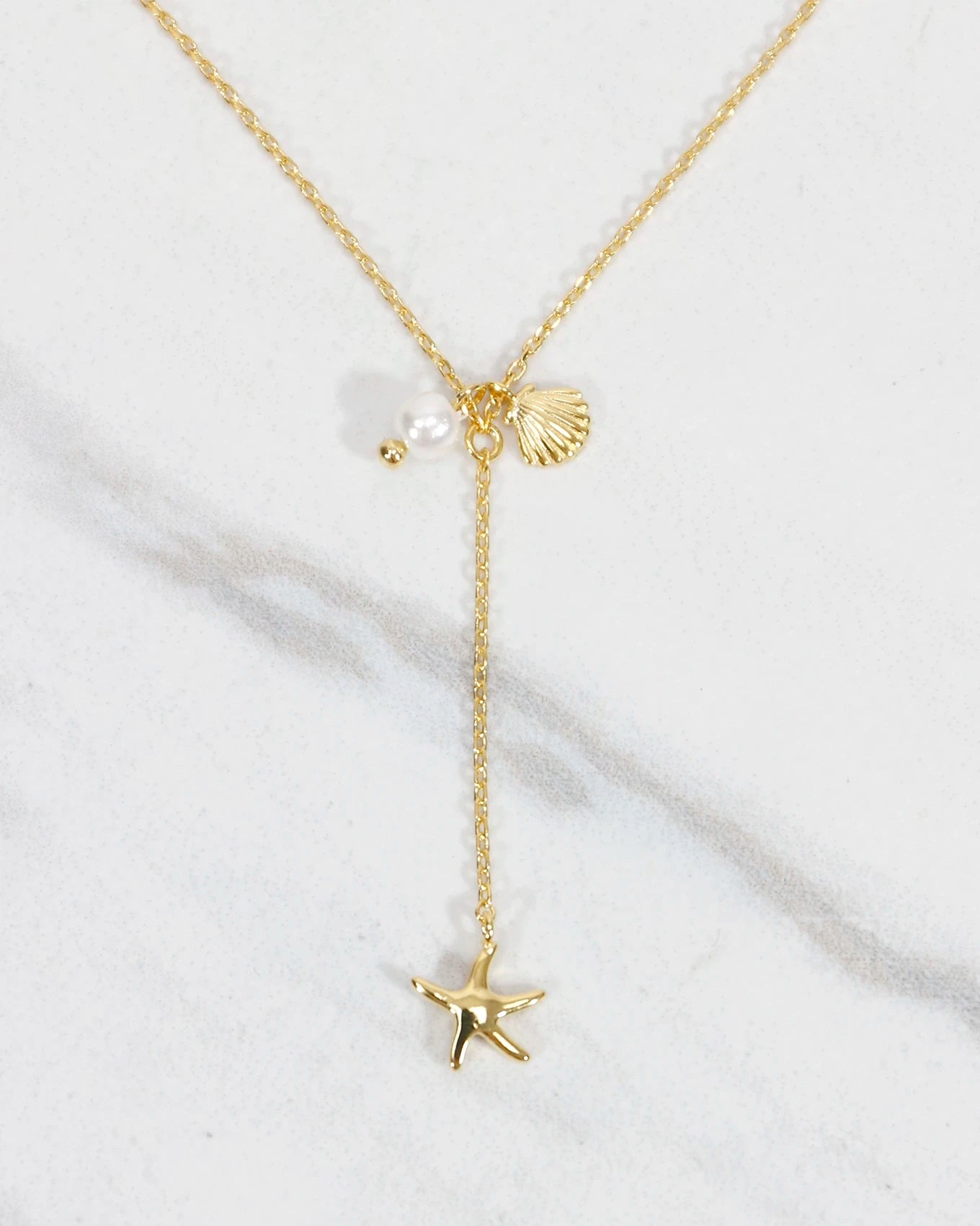 Seashells Drop Necklace in Gold