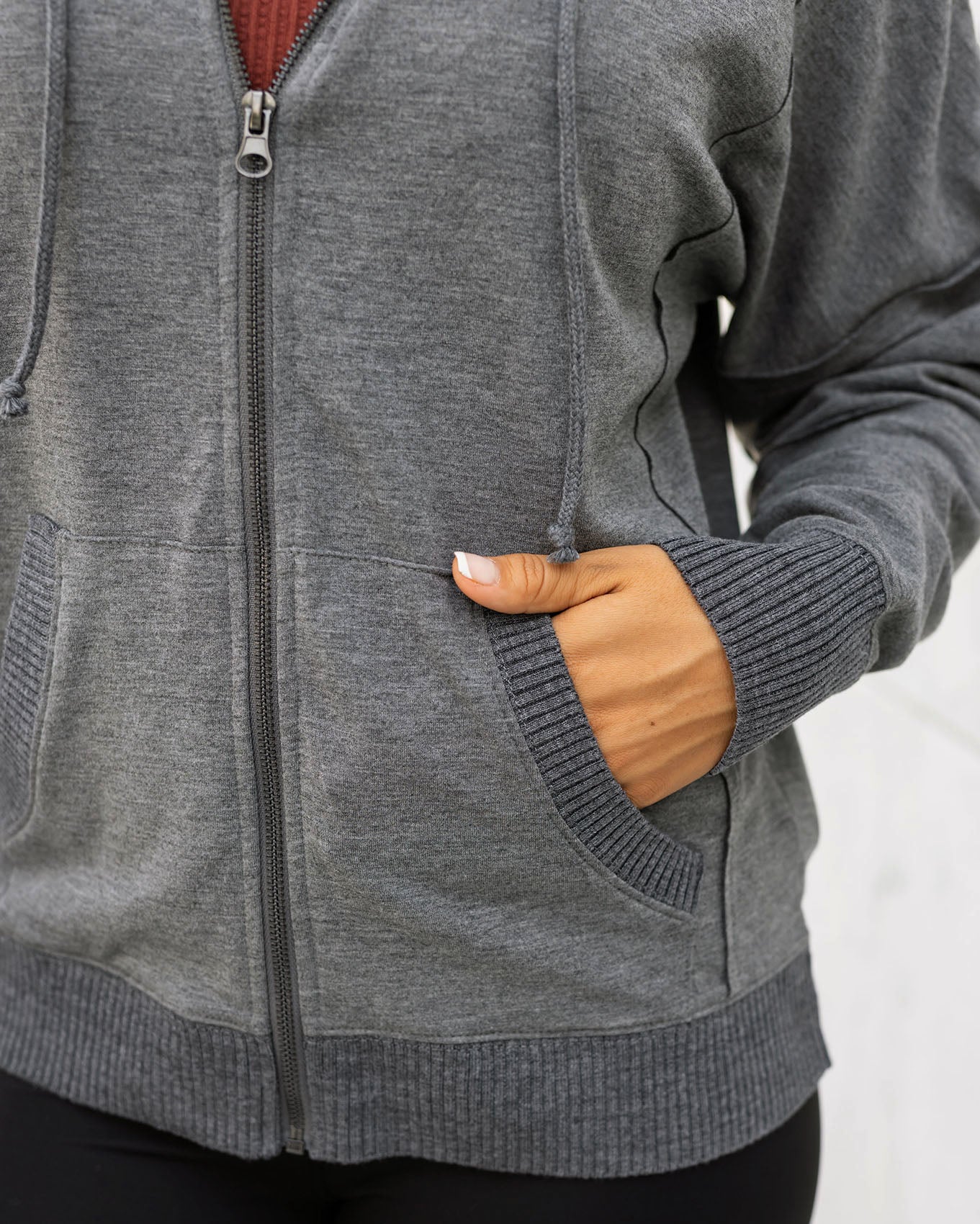 detail view of heathered grey zip up hoodie