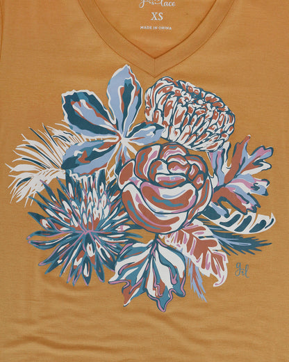 close up view of sketched floral graphic tee in mustard floral