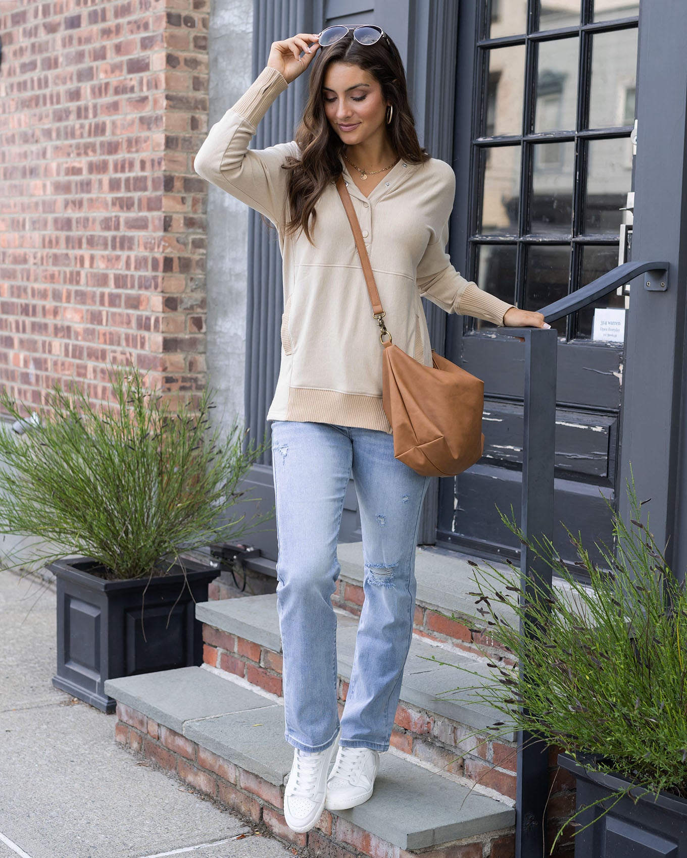 styled view of beige tunic hoodie