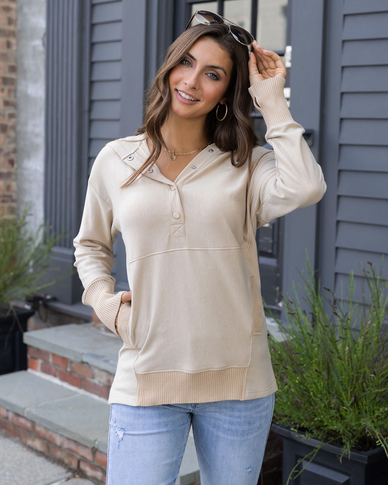 close up view of beige tunic hoodie