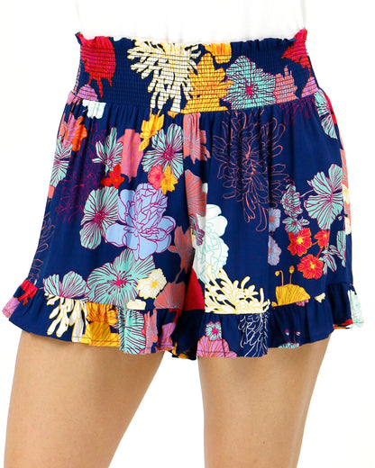 Front view stock shot of sketched floral smocked shorts