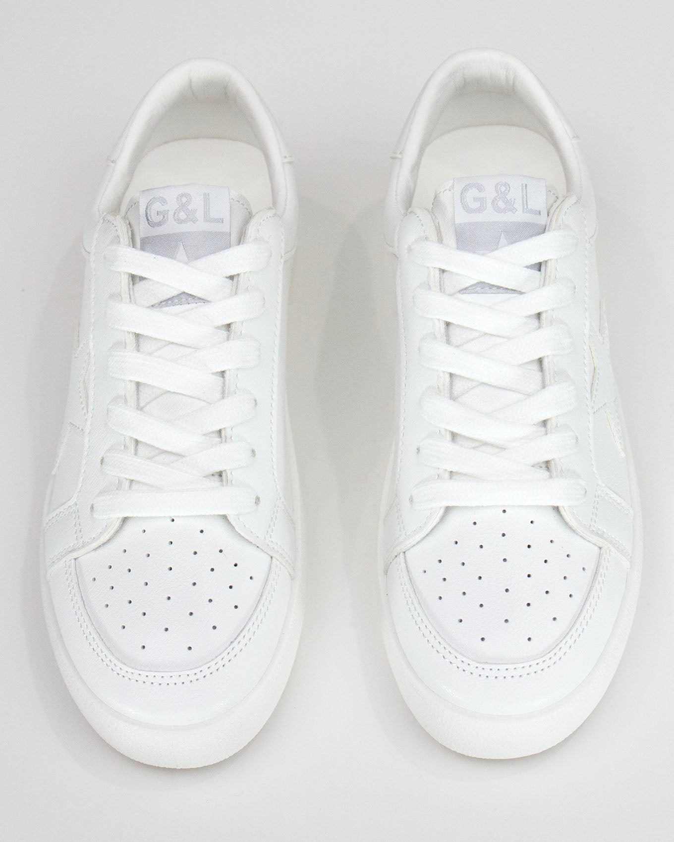top view stock shot of white star sneakers