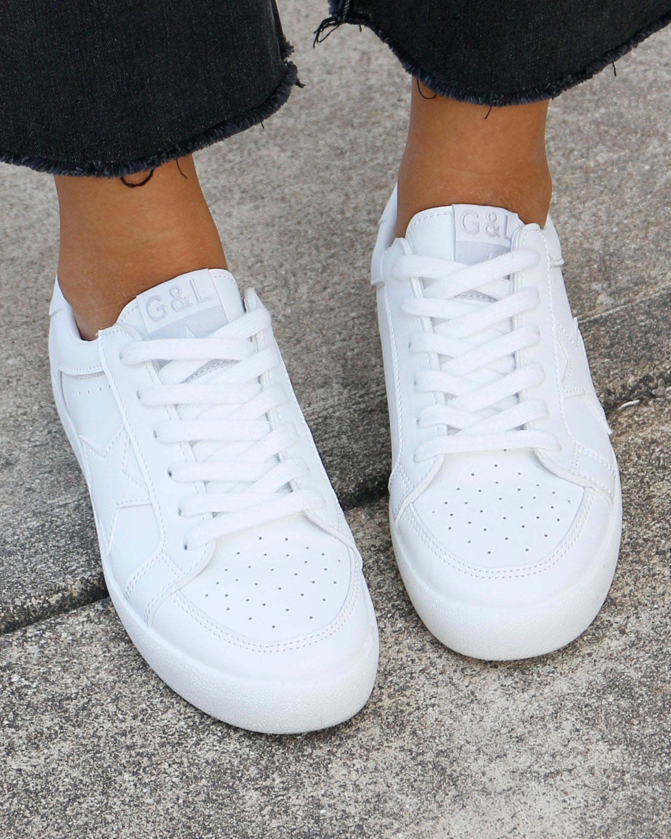 top view of white star sneakers