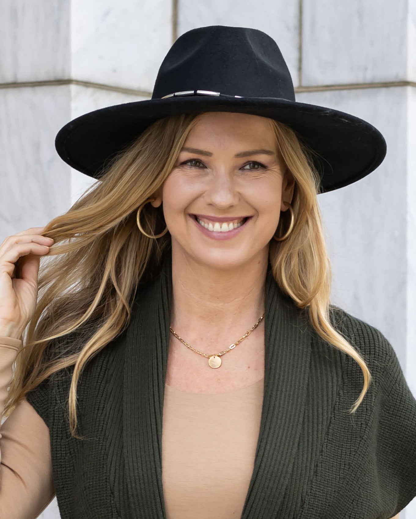 styled view of wide brim felt hat in black