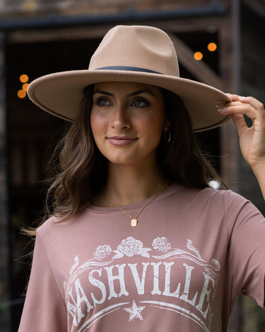 side view of wide brim felt hat in camel