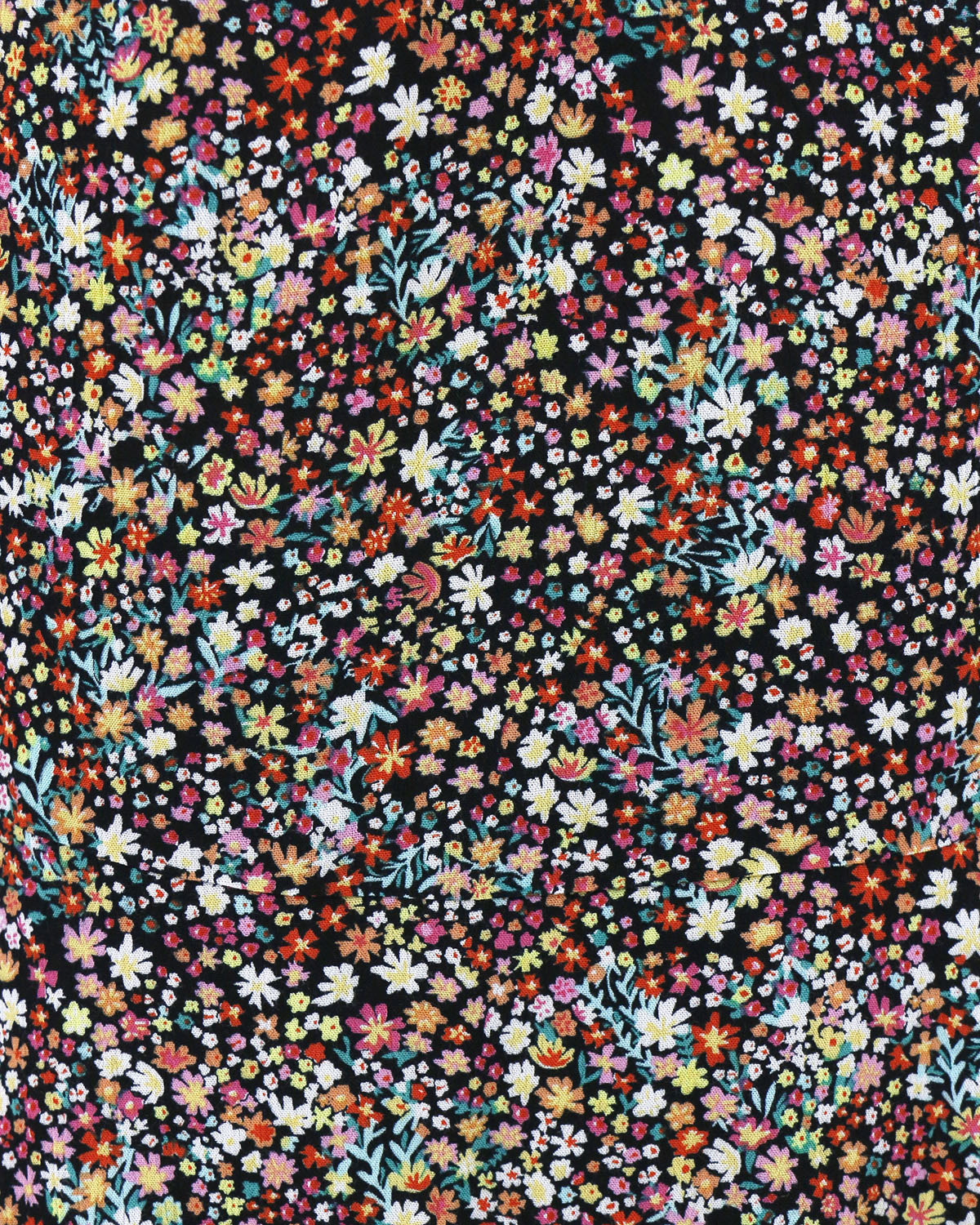 Close up of print and fabric of black floral ditsy print tank