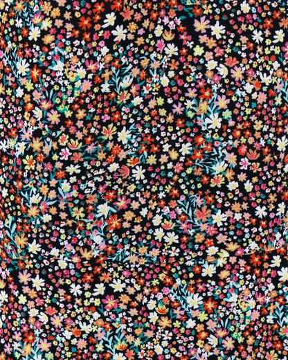 Close up of print and fabric of black floral ditsy print tank