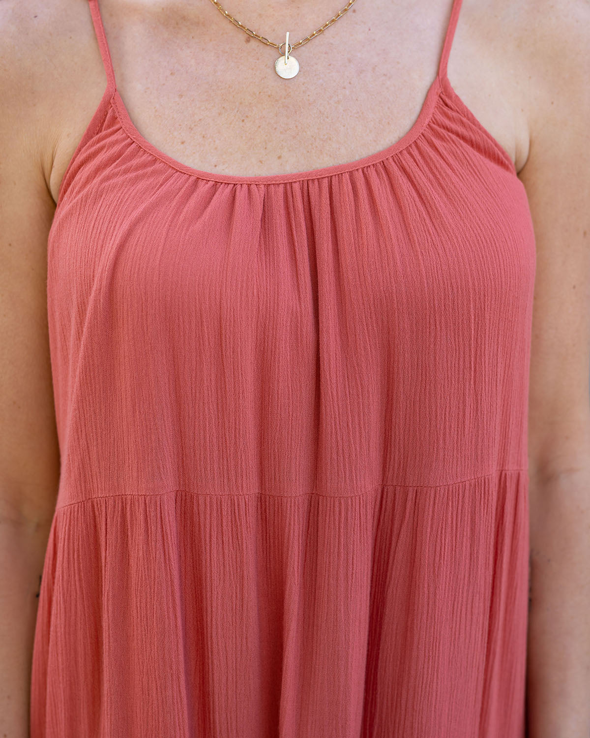 close up view of sun baked maxi dress neckline vacation tiered maxi dress