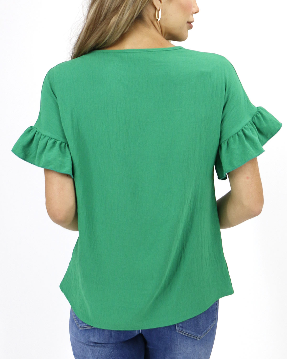 back view stock shot of vivid green shift top women's shift blouse