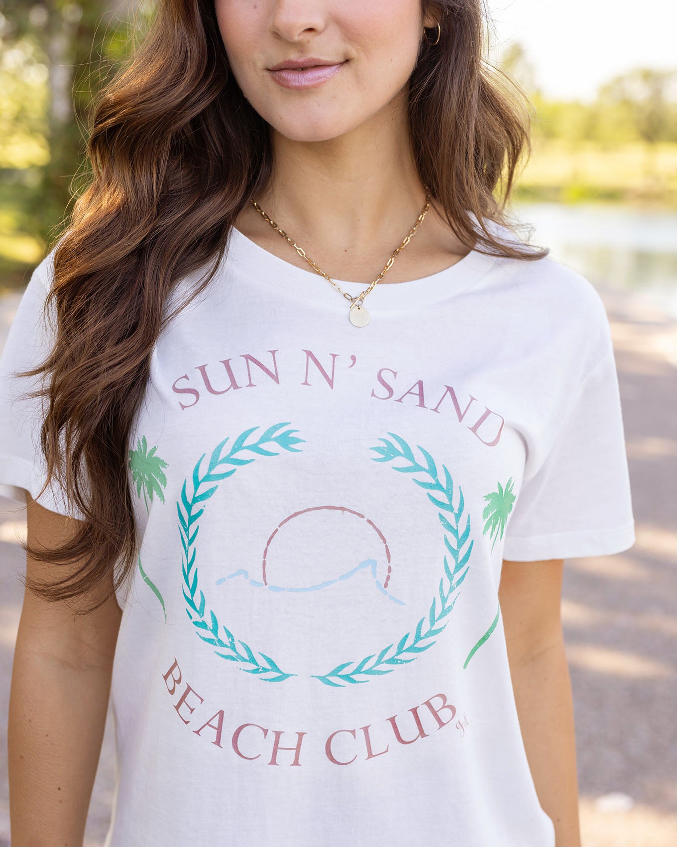 Close up view of beach club vintage fit graphic tee