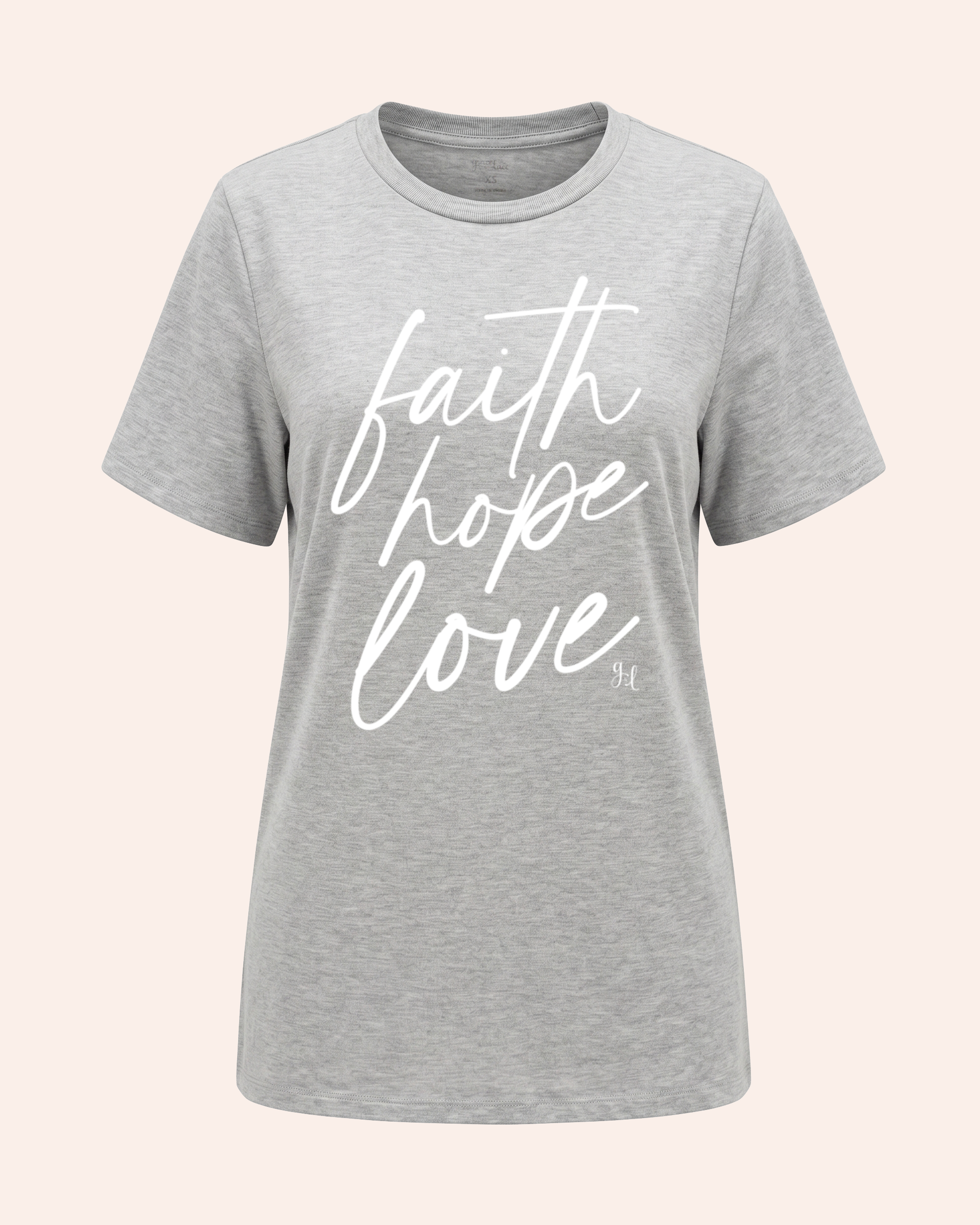 Gray t-shirt with 'faith hope love' text on a light gray background