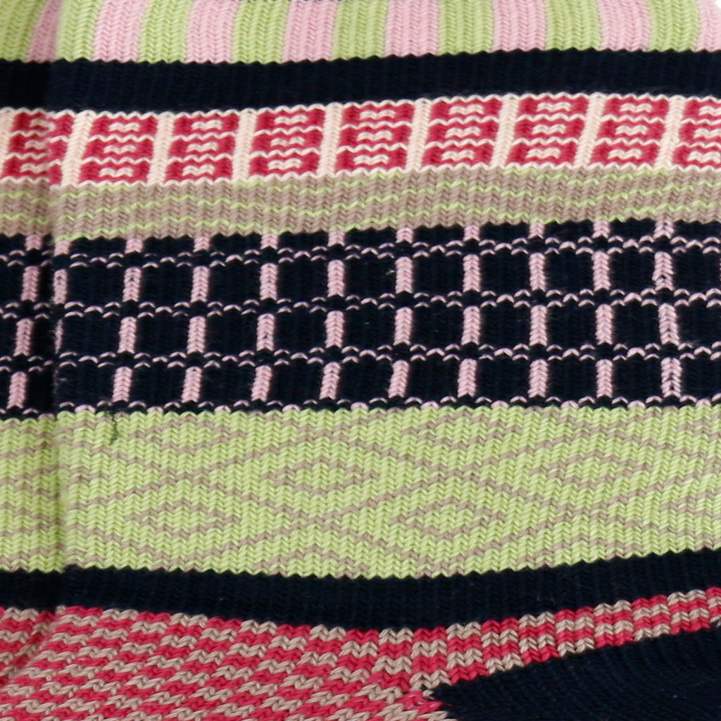 fabric view of navy/pink/lime intarsia socks