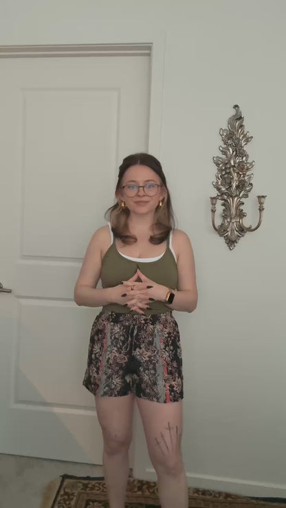 Try-on video of a model wearing the Boho Breeze Tie Shorts.