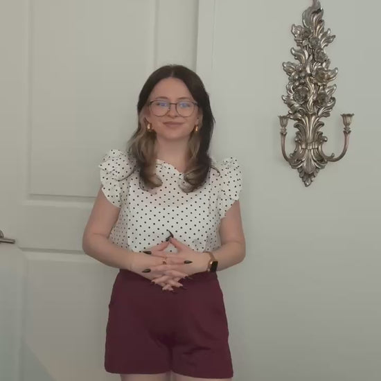 Try-on video of a model wearing the Live In Lounge Short in Burgundy.