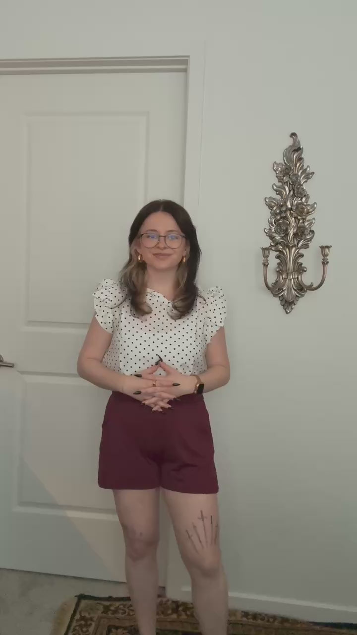 Try-on video of a model wearing the Live In Lounge Short in Burgundy.