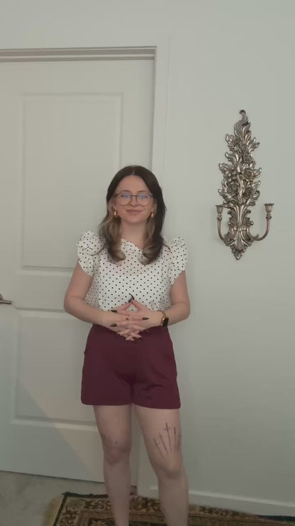 Try-on video of a model wearing the Live In Lounge Short in Burgundy.
