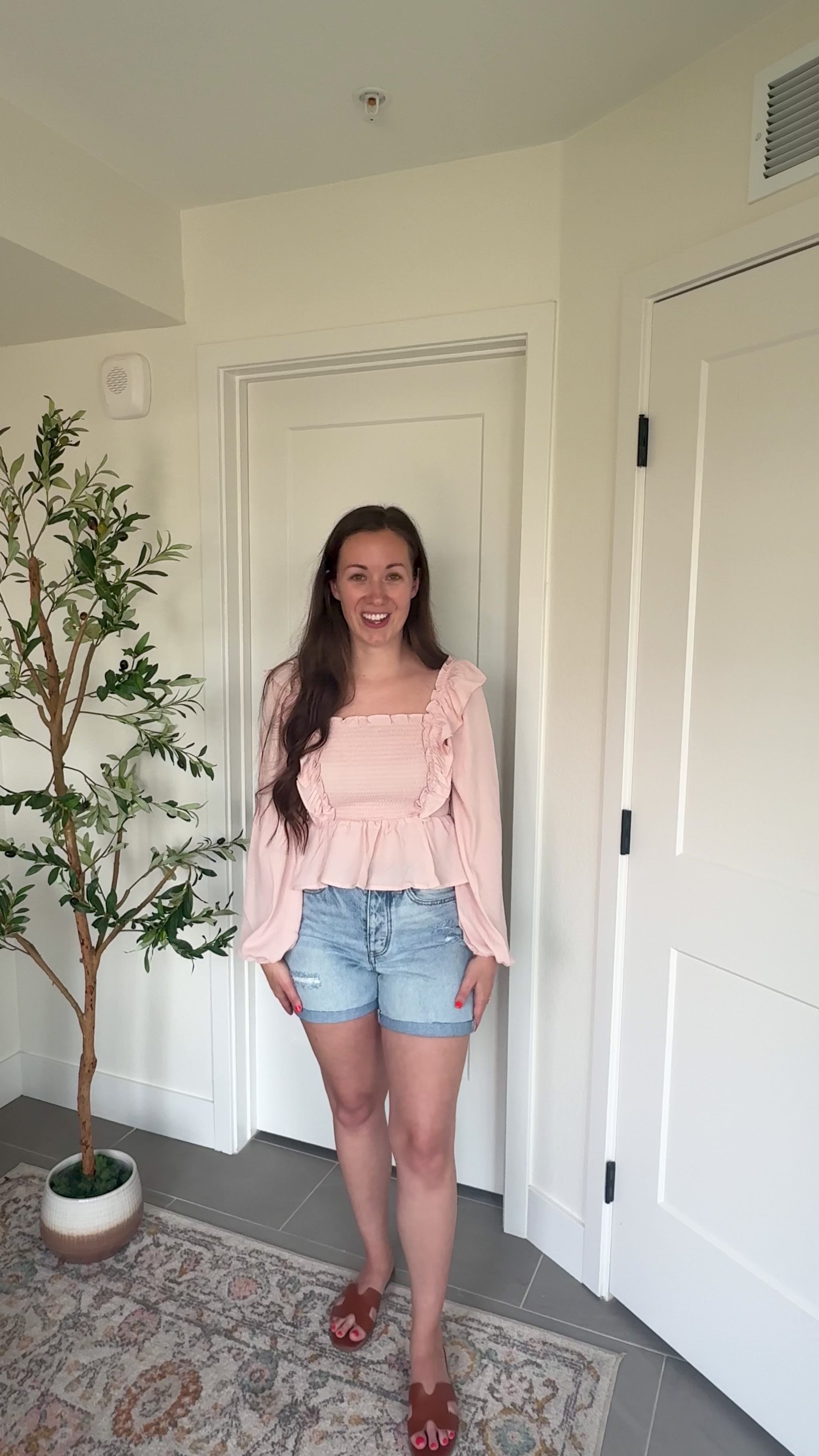 Try-on video of a model wearing the Soft Charm Chiffon Blouse.