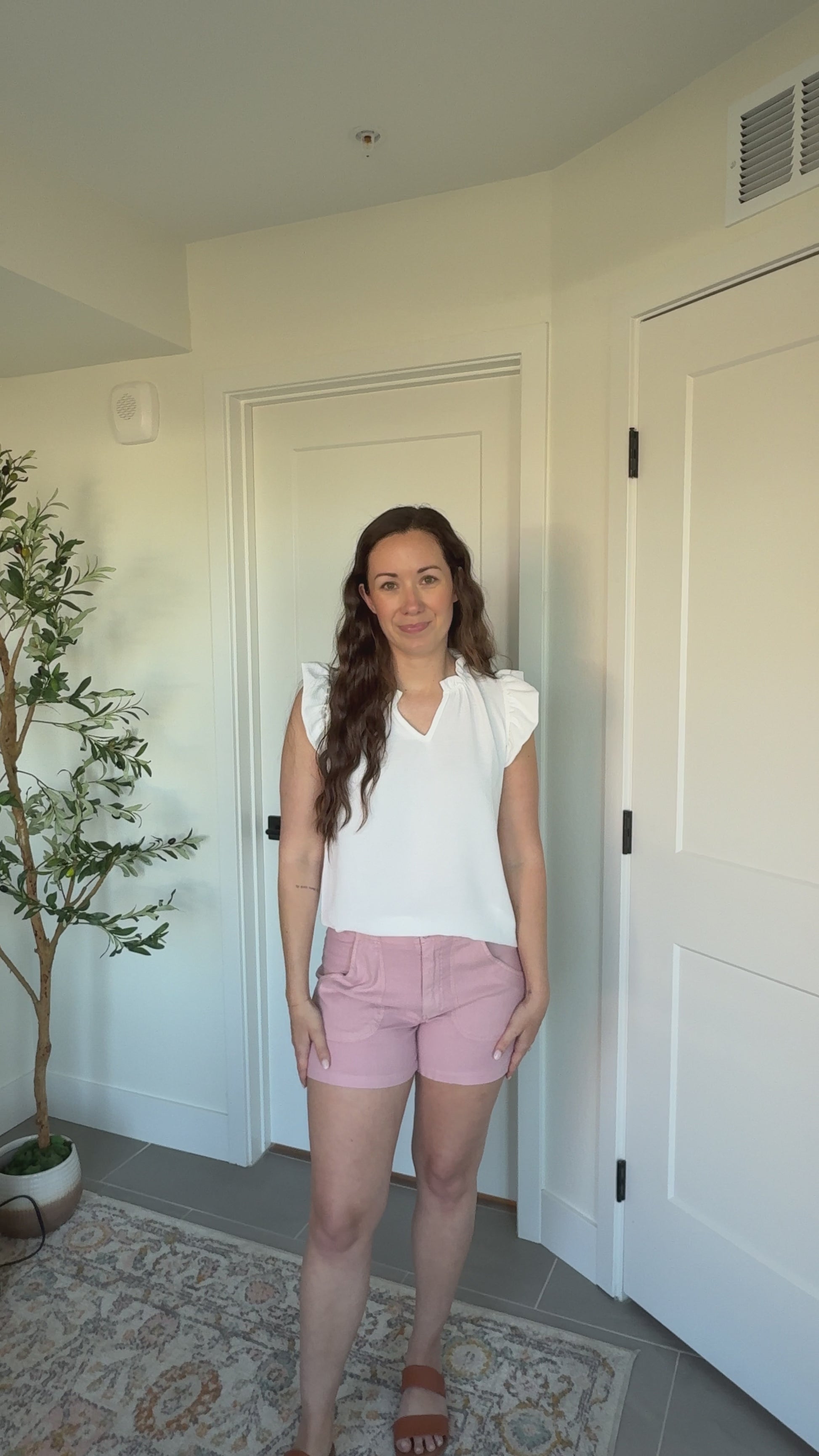 Kaitlyn wearing Classic Linen Shorts in Blush