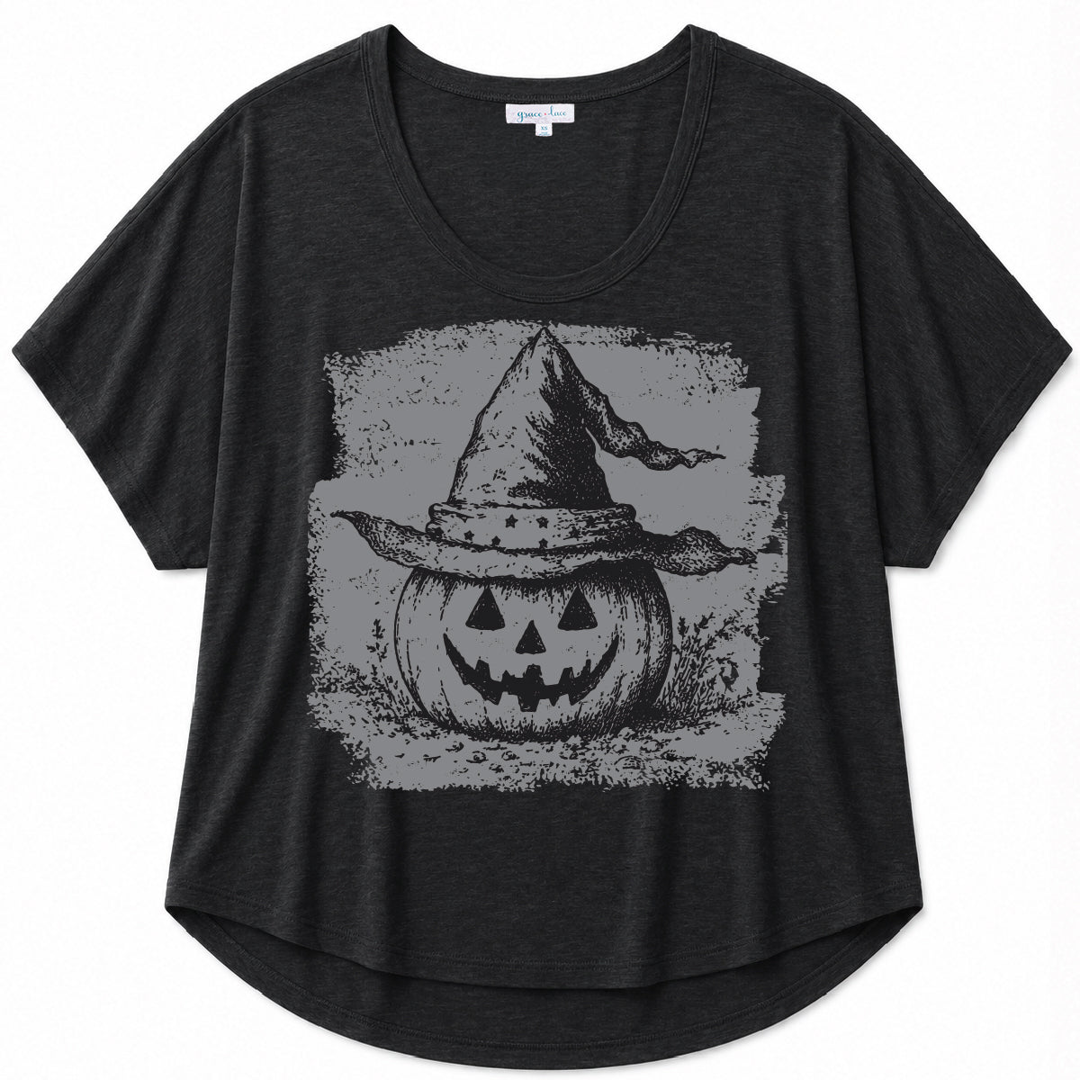 Black graphic tee with a vintage-inspired pumpkin and witch hat design on a white background