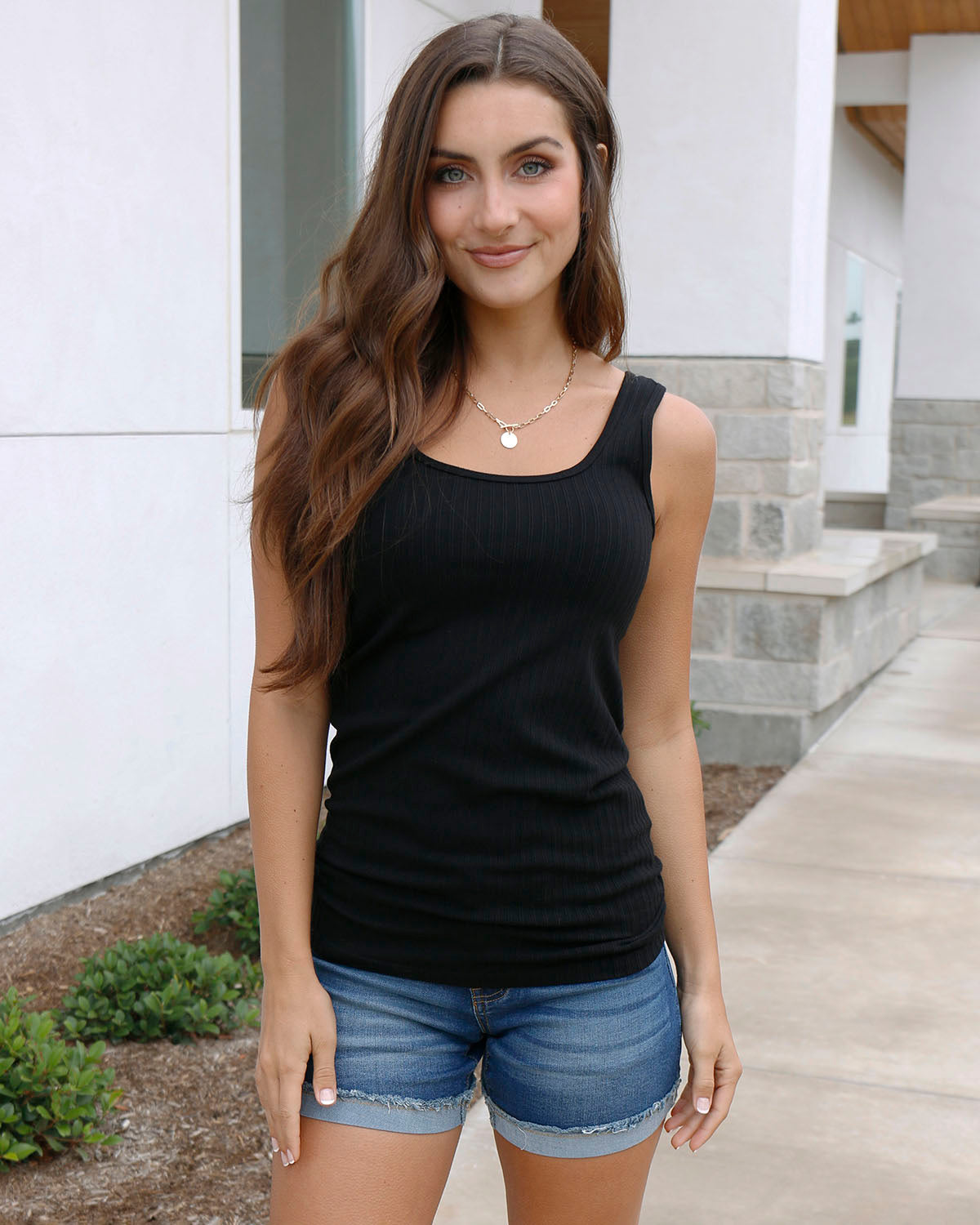 styled view of black seamless ribbed tank