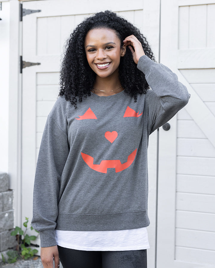 close up view of pumpkin sweatshirt