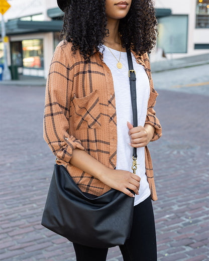 brown and black crossbody bag